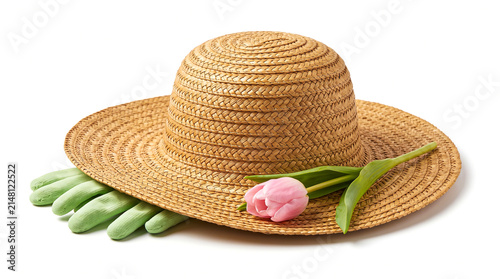 Straw hat with gardening gloves and pink tulip isolated on white background
