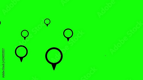 Abstract representation of multiple black map pin icons against a bright chroma key background, symbolizing digital mapping and global positioning concepts for modern interfaces