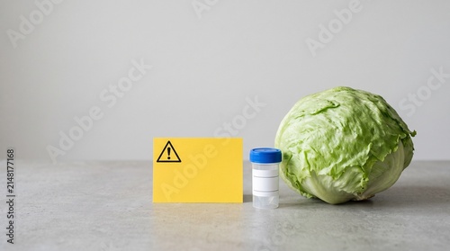 Iceberg Lettuce with Blank Caution Card and Sterile Sample Container for Food Recall Alert Concept