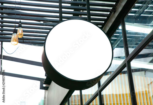 Photography Blank white round outdoor signboard mockup hanging under modern ceiling