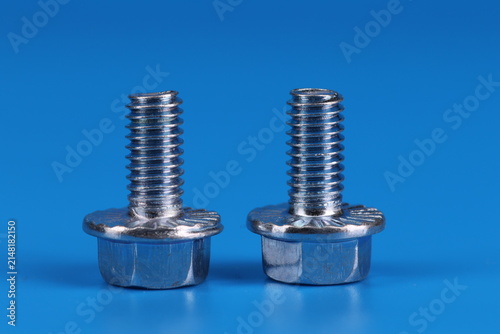 Metal screws for fastening equipment. Soft focus. Close-up. 