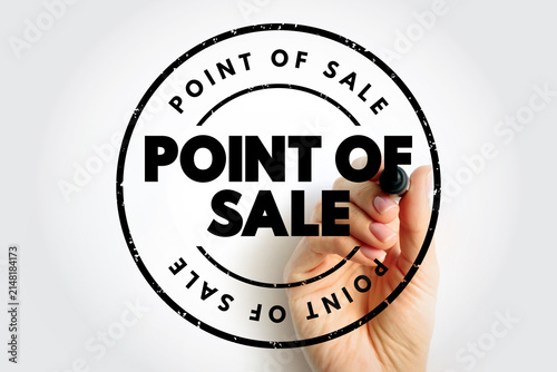 POINT OF SALE text in a circular rubber stamp held by a person. Retail technology and transaction system concept