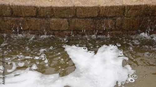 Water flowing in a slow motion fountain cascade