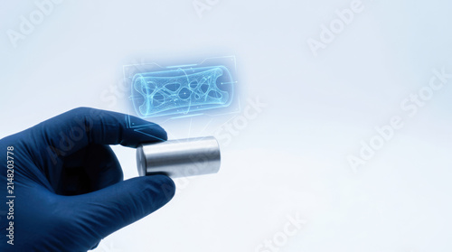 Hand glove metal cylinder futuristic technology science innovation research laboratory gloved hand holds metal cylinder with futuristic