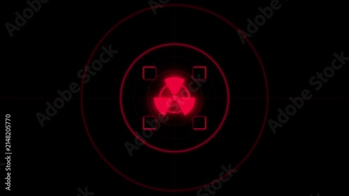 Red circular target with nuclear symbol on dark background  