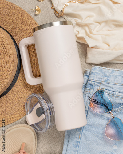 Blank ivory 40oz tumbler mockup, stainless steel travel thermos on denim and dark red sweatshirt
