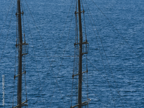 Foto Tall masts of a large sailing yacht