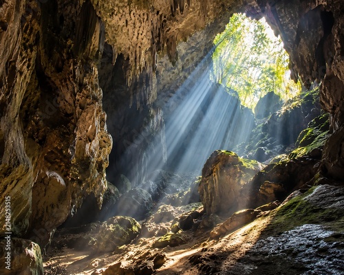 Sun rays entering through a cave opening