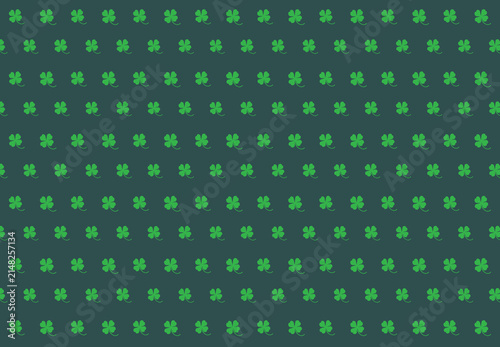Fotografie A green clover leaf on a Dark Slate Gray background