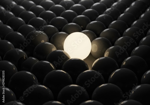 A solitary, bright, distinct sphere stands out dramatically from a large, monotonous arrangement of identical gray spheres ,isolated ,concept ,differentiation