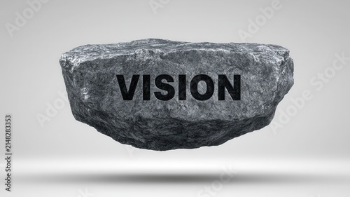 A stone with the word vision, symbolizing business vision, strategic thinking, leadership, goals, ambition, future planning, and long-term success.