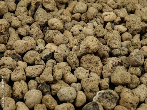 Heap of the  drainage materials, clay balls  for a potted houseplant, top view, natural background
 