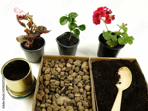 Flower potting mix, drainage materials. Houseplant repotting materials. Flower transplanting.

