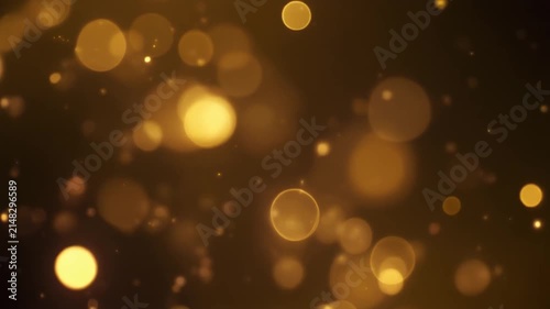 Luces bokeh doradas flotando suavemente sobre fondo oscuro