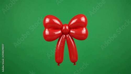 Red bow on a green background.