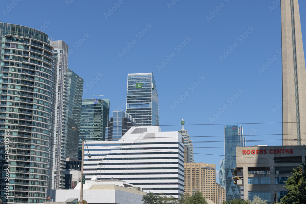 Fototapeta premium looking east over Spadina Avenue bridge/overpass at the Union Station Rail Corridor to buildings in the downtown Toronto core, including TD Terrace