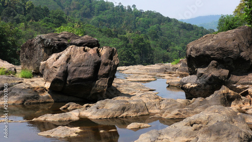 Фотография Beautiful rocky landscape adjacent to the Ripple Waterfalls near Munnar, Idukki,