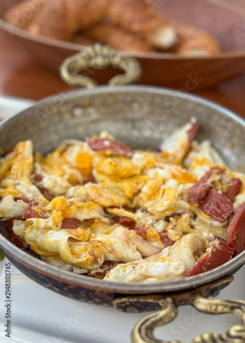 Traditional Turkish Fried Eggs with Garlic Sausage

