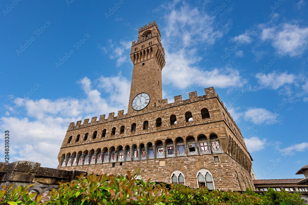 Fototapeta premium Palazzo Vecchio is a historic building in Florence, in the Piazza della Signoria, built between 1299 and 1314 according to designs by Arnolfo di Cambio; one of the most famous buildings in the city.