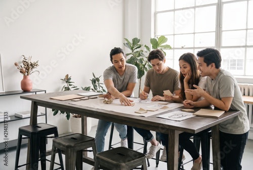 Small Group Working Together In Workshop Breakout
