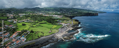 Aerial panoramic view of Poços de São Vicente Ferreira, a volcanic natural swimming area on the north coast of São Miguel Island, Azores, Portugal.