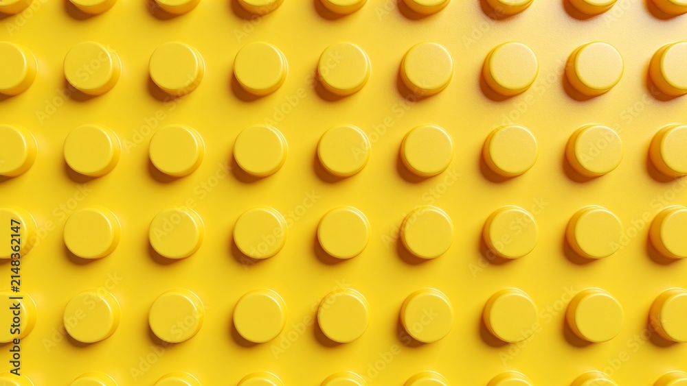 Naklejka premium Yellow LEGO brick surface with circular studs pattern