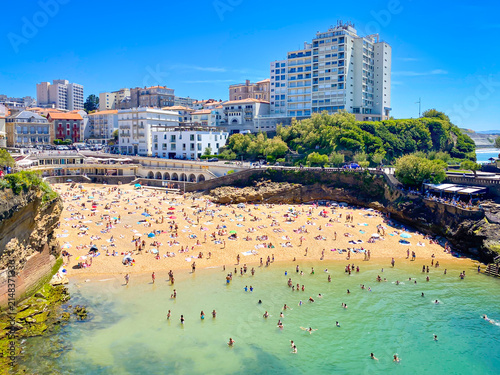 High-angle view of tourists swimming in the waters of Port Vieux cove in Biarritz, France