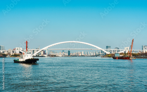 Canvas Print White Lupu Bridge Arch Over Huangpu River Urban Skyline at Shanghai China