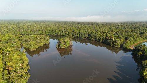 Photography Aerial view of the La Comté River surrounded by tropical rainforest in French Guiana