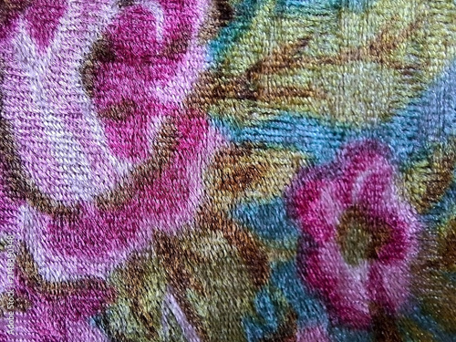 Colorful Velvety Fabric Texture Intricate Floral Pattern Soft Plush Material Abstract Background