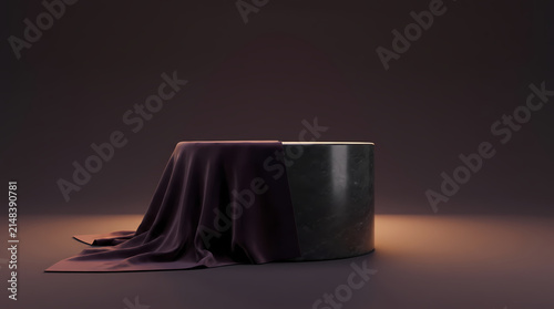 Luxury black marble cylinder podium partially covered with dark burgundy silk fabric