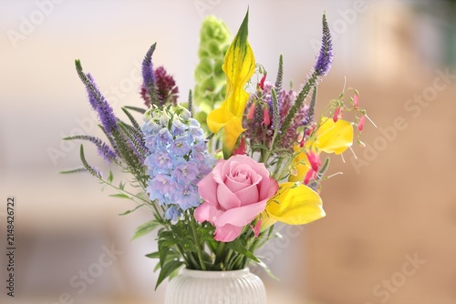 Bouquet of beautiful summer flowers in vase indoors, closeup