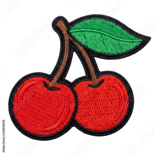 Two cherries with green leaf embroidered patch badge isolated background