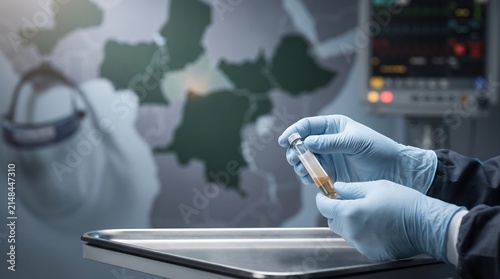Medical Professional Holding Vaccine Vial Against Africa Map Background
