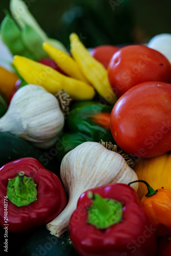 Fresh vegetables displayed on a table during a market event