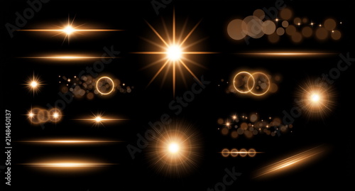 Golden spark flare light effects on black background 華やかな金の閃光とキラキラ光エフェクト