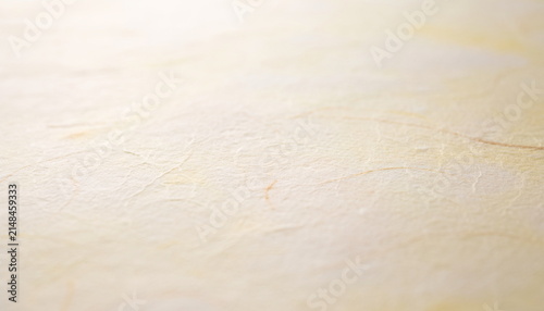 Warm beige Japanese paper texture background 温かみのある柔らかなグラデーションのベージュ和紙背景