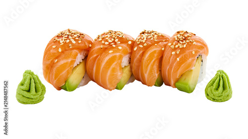 Fotografie Four salmon avocado sushi rolls with sesame seeds and two dollops of wasabi, iso