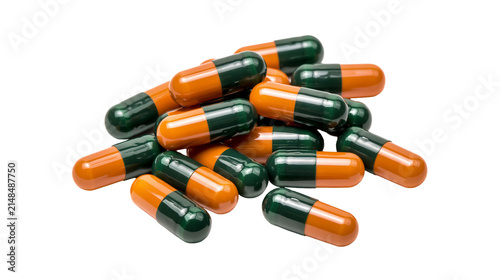 Pile of orange and green capsules, isolated on transparent background