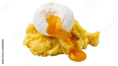Fotografie Poached egg with runny yolk over fluffy scrambled eggs, isolated on transparent
