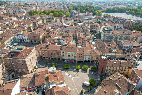Aerial view of the historic center of Asti with its terracotta rooftops, medieval towers, and narrow streets in Asti, Piedmont, Italy.