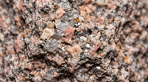 Macro Close-Up of Multicolored Crystalline Rock and Metallic Mineral Flecks