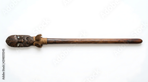 Traditional Maori Wooden Taiaha Weapon Isolated on a Plain White Background