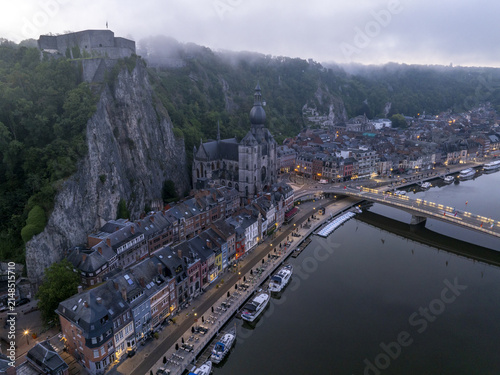 Aerial view of the Collegiate Church of Notre-Dame de Dinant and the Citadel of Dinant overlooking the Meuse River in Dinant, Wallonia, Belgium.