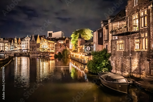 Illuminated Historic Buildings and Canalside View at Night in Ghent, Belgium