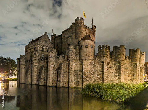 Gravensteen Castle Walls and Towers Against a Cloudy Sky in Ghent, Belgium