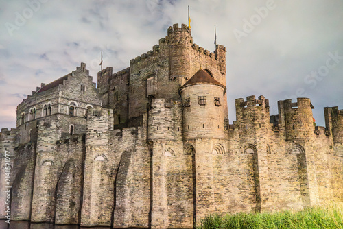 Gravensteen Castle Walls and Towers Against a Cloudy Sky in Ghent, Belgium