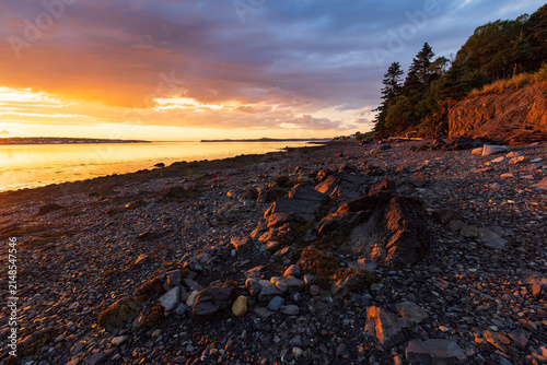 Golden Hour Sunset Over Rocky Beach Shoreline on Campobello Island, New Brunswick