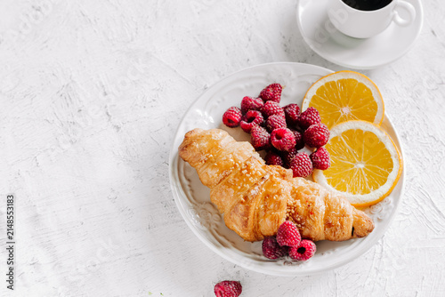 Continental Croissants, breakfast, pastry, espresso, black coffee, orange juice, fresh raspberries, berries, fruit