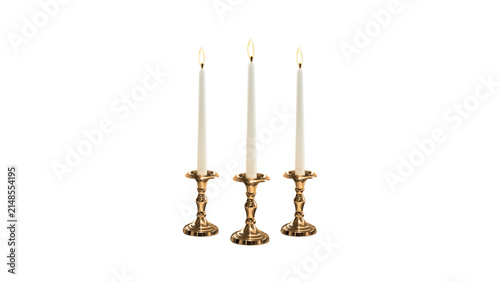 Fotografie Three Gold Candlesticks with Lit White Taper Candles Isolated on White Backgroun